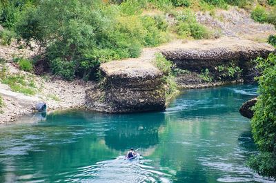 High angle view of man surfing in water