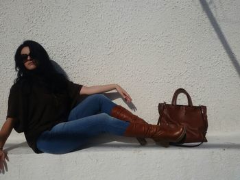 Woman sitting outdoors