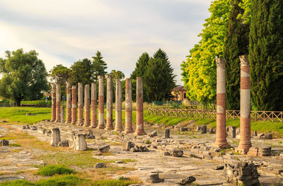 View of old ruins against cloudy sky