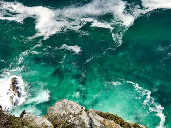 High angle view of rocks on beach at cape point 