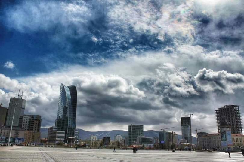 building exterior, architecture, built structure, city, sky, cloud - sky, skyscraper, cloudy, modern, office building, tall - high, cityscape, cloud, urban skyline, weather, tower, building, city life, skyline, day