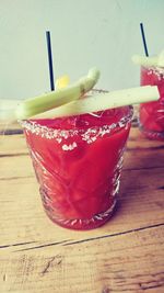 Close-up of red fruit on table