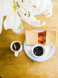 High angle view of coffee cup on table