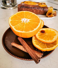 High angle view of orange slices in plate