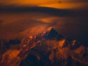 Scenic view of mountains against sky during sunset