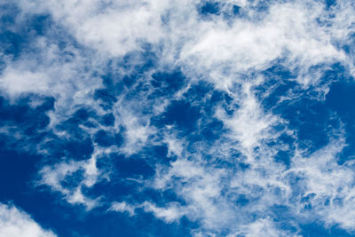 Low angle view of cloudy blue sky