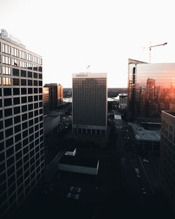 Exterior of modern buildings against clear sky