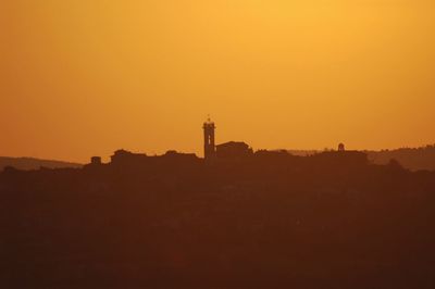 View of built structure at sunset