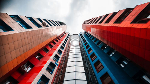 Low angle view of modern buildings against sky