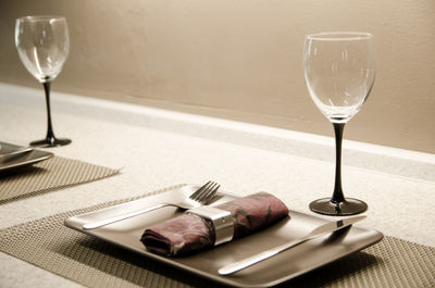 Close-up of wineglass on table