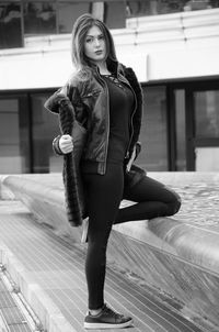 Full length portrait of woman