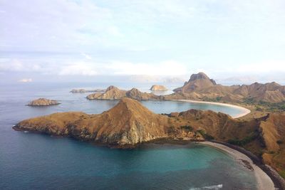 Panoramic view of sea and rocks against sky