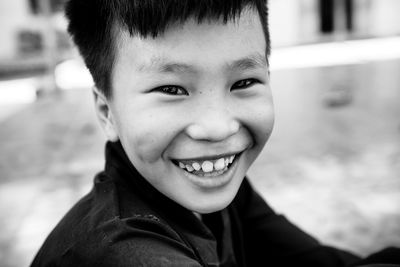 Portrait of smiling boy outdoors
