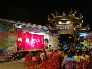 Illuminated entrance of building at night