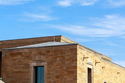 Low angle view of old building against sky