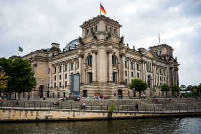 View of historical building in city against sky