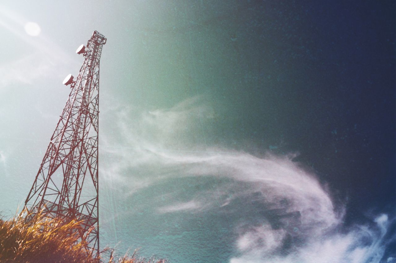 sky, cloud - sky, technology, connection, low angle view, tower, architecture, built structure, nature, tall - high, no people, communication, metal, day, outdoors, global communications, industry, plant, wireless technology, power supply