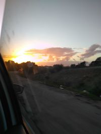 Road against sky during sunset