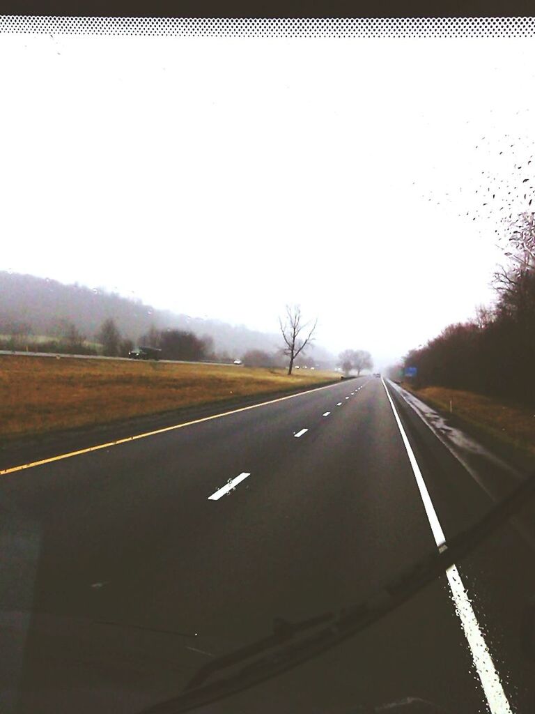 transportation, road, road marking, the way forward, diminishing perspective, clear sky, vanishing point, mode of transport, country road, copy space, windshield, car, highway, landscape, on the move, land vehicle, sky, travel, empty, car point of view