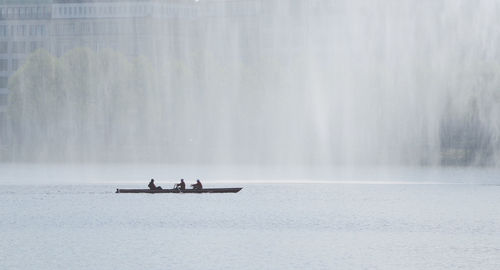 People on boat in sea