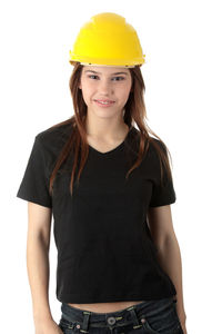 Portrait of a smiling young woman against white background