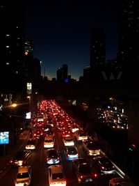 High angle view of illuminated cityscape at night