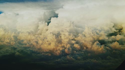 Scenic view of landscape against cloudy sky