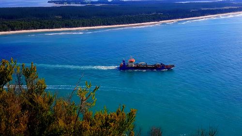 Boat sailing in sea