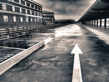 View of road against cloudy sky