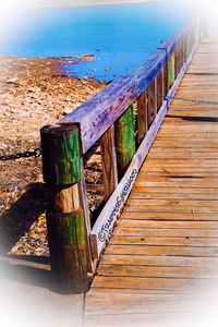 Close-up of wooden pier over water