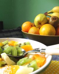 Close-up of fruits in bowl on table