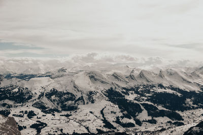 Aerial view of dramatic landscape against sky