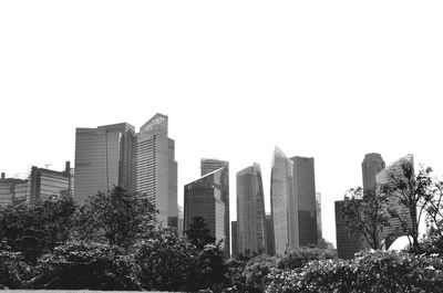 Low angle view of skyscrapers against clear sky