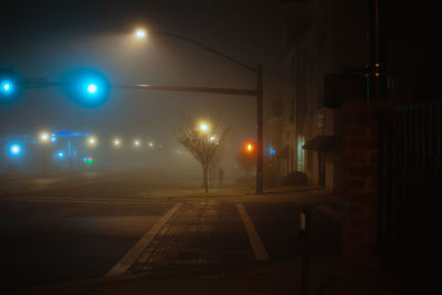 Illuminated street at night