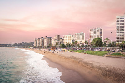 Scenic view of beach against sky during sunset