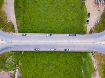 High angle view of airport runway seen through airplane