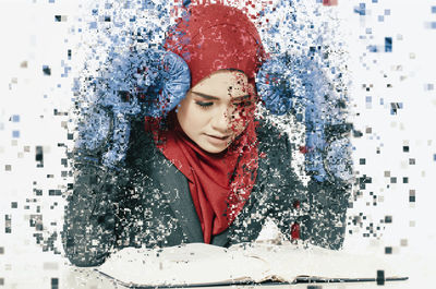 Portrait of woman with red eyes closed in winter