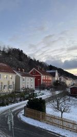 Buildings in city against sky