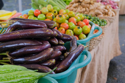 High angle view of fruits in basket at market stall