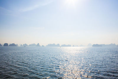 Scenic view of sea against sky on sunny day