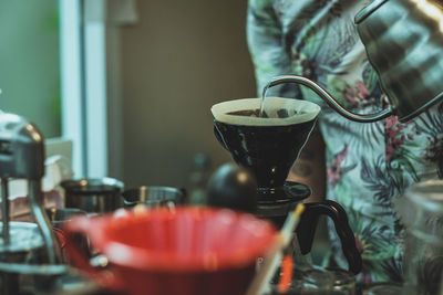 Barista drip coffee,man is making coffee