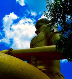 Low angle view of building against blue sky