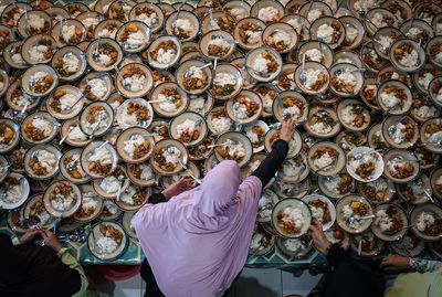 High angle view of man preparing food