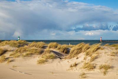 Scenic view of beach against sky