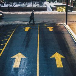 Man crossing city street