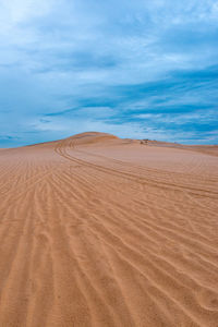 Scenic view of desert against sky