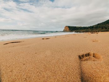 Scenic view of beach against sky