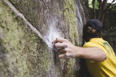 Close up of a rock climber hand on rock