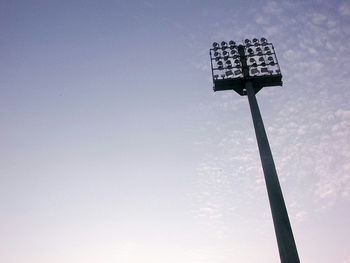 Low angle view of street light against sky