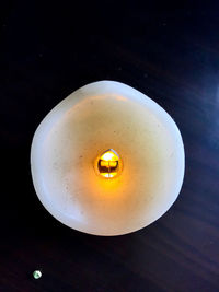 Close-up of illuminated light bulb